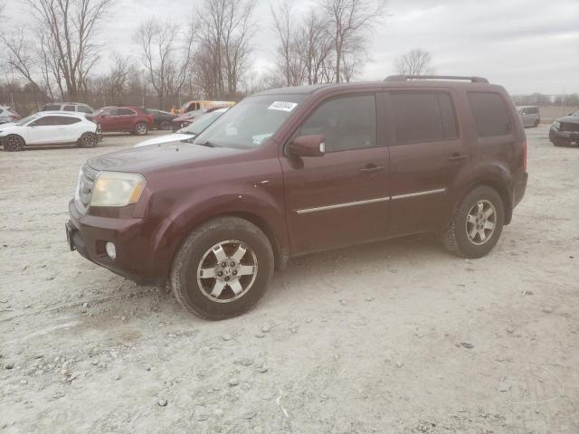 HONDA PILOT TOUR 2011 with VIN 5FNYF4H95BB023578 - Photo from auction