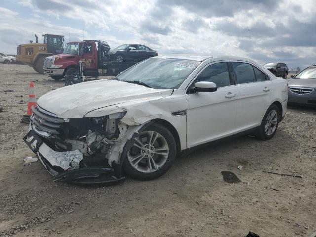 FORD TAURUS SEL 2015 with VIN 1FAHP2E81FG100090 - Photo from auction