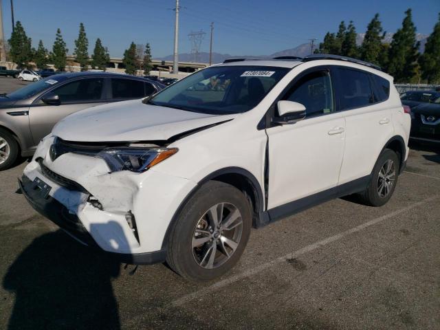 TOYOTA RAV4 XLE 2017 with VIN JTMWFREV6HD094407 - Photo from auction