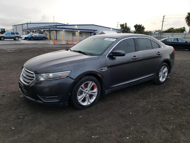 FORD TAURUS SEL 2015 with VIN 1FAHP2E8XFG177962 - Photo from auction