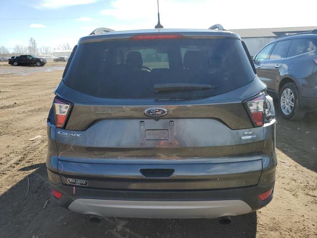 Photo 6 from auction – 2018 FORD ESCAPE SE with VIN 1FMCU9GD2JUD28461