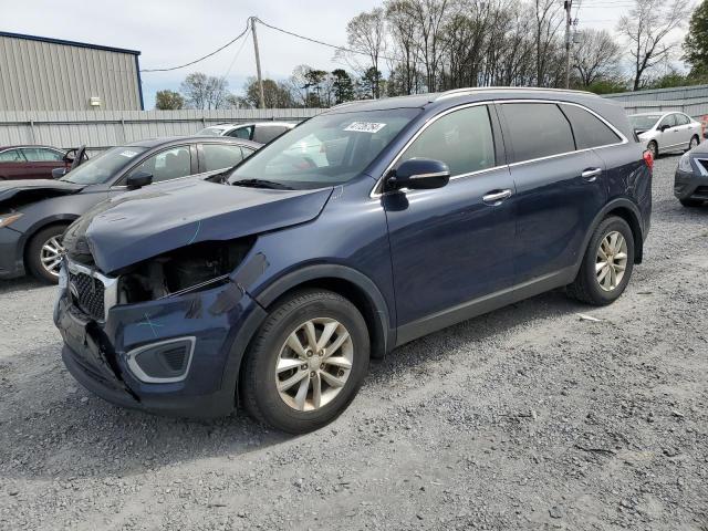 KIA SORENTO LX 2016 with VIN 5XYPGDA37GG046472 - Photo from auction