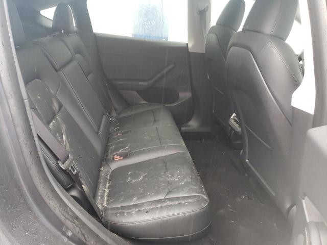Photo 11 from auction – 2023 TESLA MODEL Y with VIN LRWYGDEE7PC163003