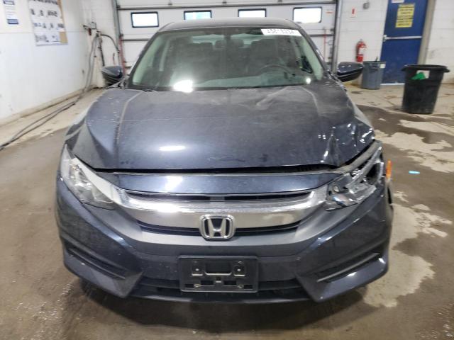 Photo 5 from auction – 2017 HONDA CIVIC LX with VIN 19XFC2F50HE069161