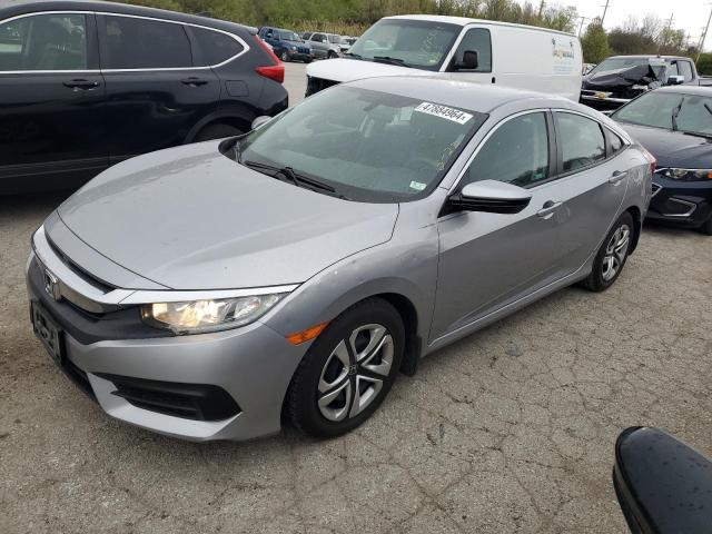 HONDA CIVIC LX 2018 with VIN 19XFC2F55JE002626 - Photo from auction