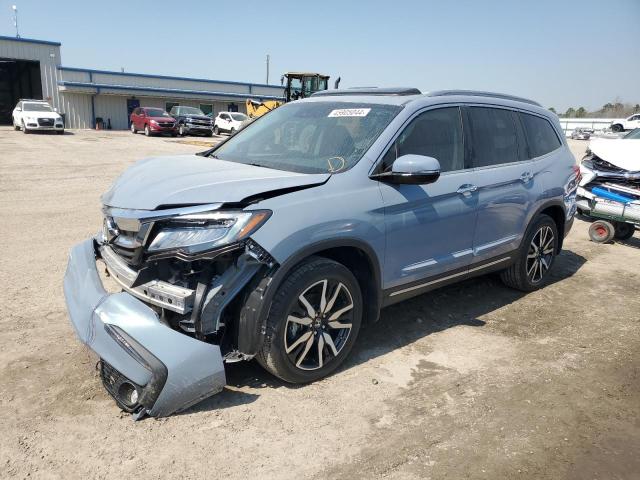 HONDA PILOT TOUR 2022 with VIN 5FNYF6H6XNB063256 - Photo from auction