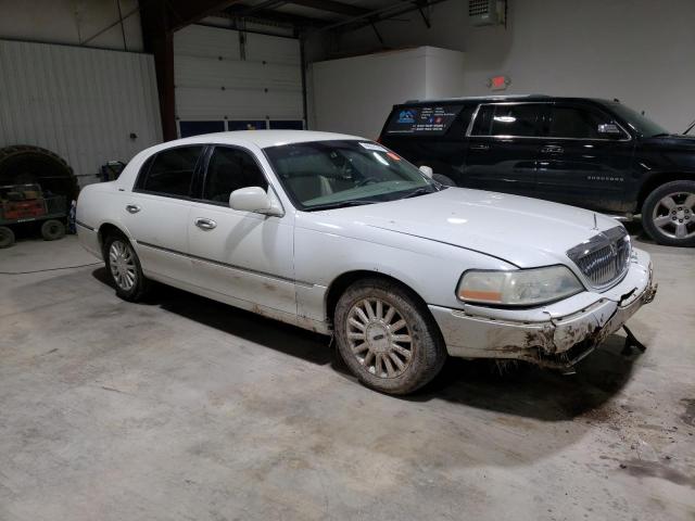 Photo 4 from auction – 2003 LINCOLN TOWN CAR E with VIN 1LNHM81W73Y694678