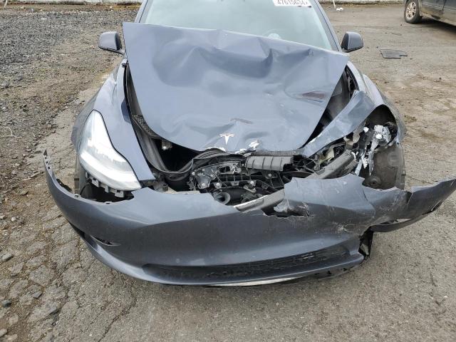 Photo 11 from auction – 2018 TESLA MODEL 3 with VIN 5YJ3E1EB9JF170911