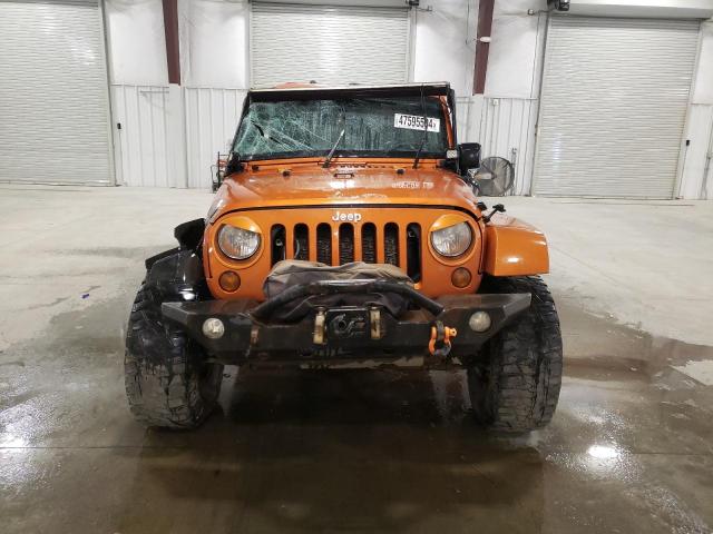 Photo 5 from auction – 2011 JEEP WRANGLER U with VIN 1J4BA5H15BL577635