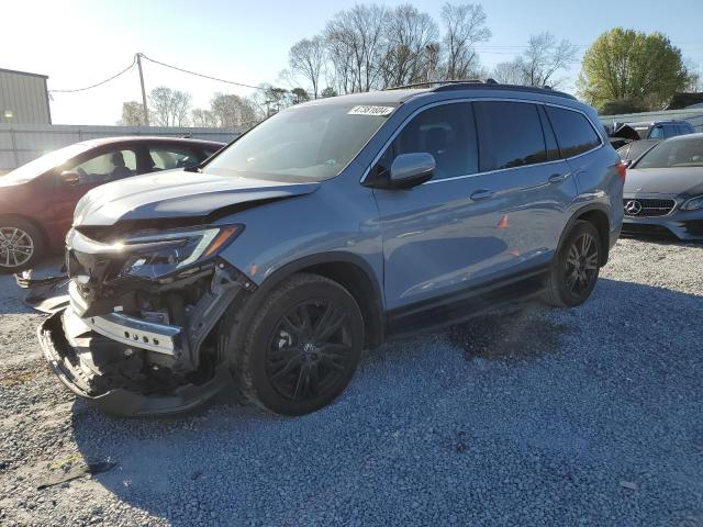 HONDA PILOT SE 2022 with VIN 5FNYF5H24NB022628 - Photo from auction