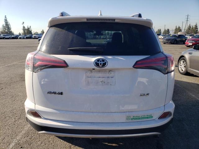 Photo 6 from auction – 2017 TOYOTA RAV4 XLE with VIN JTMWFREV6HD094407