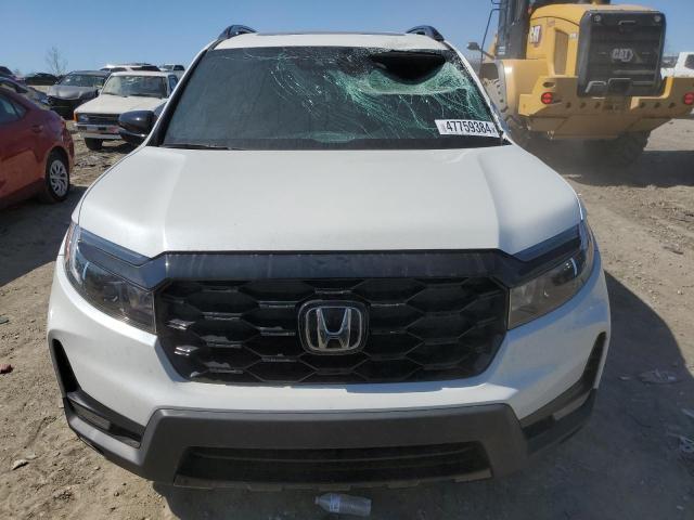Photo 5 from auction – 2022 HONDA PASSPORT E with VIN 5FNYF8H02NB003463