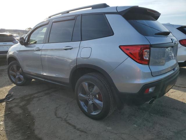 Photo 2 from auction – 2021 HONDA PASSPORT T with VIN 5FNYF8H91MB039870