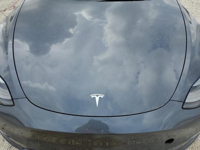 Photo 11 from auction – 2022 TESLA MODEL Y with VIN 7SAYGDEF0NF460449