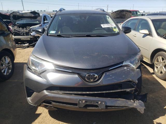 Photo 5 from auction – 2018 TOYOTA RAV4 LE with VIN JTMBFREV5JD242048