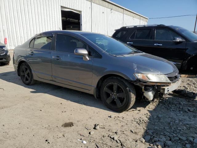 Photo 4 from auction – 2011 HONDA CIVIC LX-S with VIN 19XFA1F62BE022441