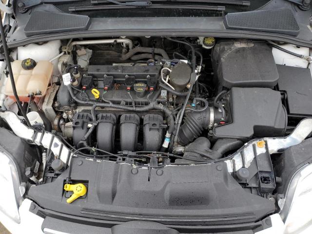 Photo 11 from auction – 2014 FORD FOCUS SE with VIN 1FADP3F28EL258883