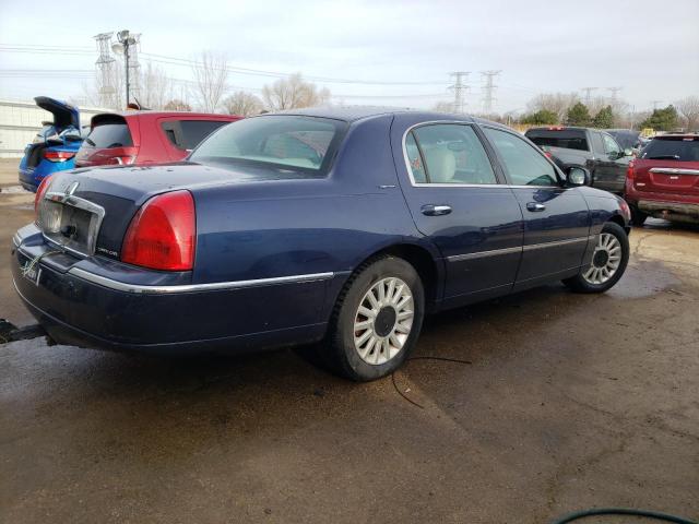 Photo 3 from auction – 2004 LINCOLN TOWN CAR E with VIN 1LNHM81W94Y631289
