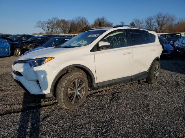 TOYOTA RAV4 XLE 2017 with VIN JTMRFREV8HJ130077 - Photo from auction