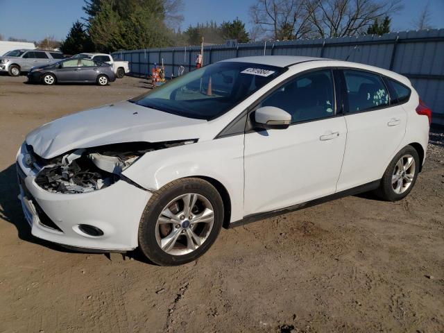 FORD FOCUS SE 2013 with VIN 1FADP3K2XDL325360 - Photo from auction