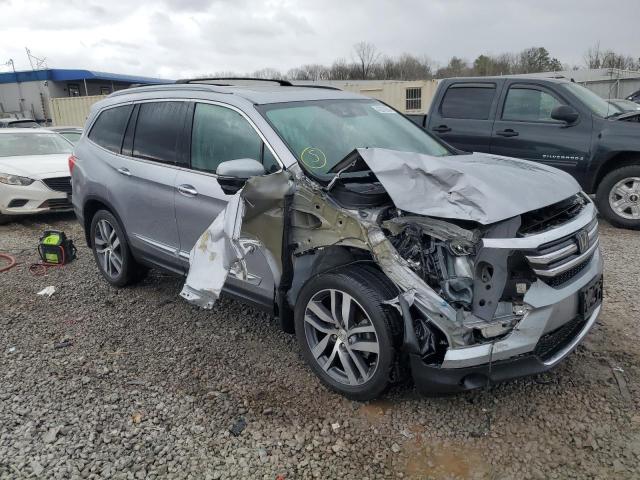 Photo 4 from auction – 2017 HONDA PILOT TOUR with VIN 5FNYF5H93HB038854