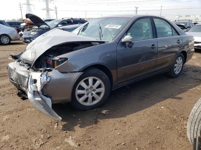 TOYOTA CAMRY LE 2002 with VIN 4T1BE30K42U566070 - Photo from auction