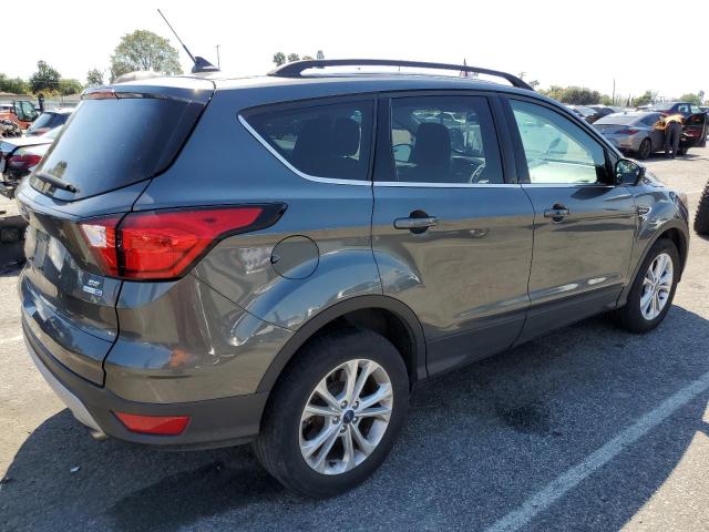 Photo 3 from auction – 2019 FORD ESCAPE SE with VIN 1FMCU9GD2KUB59852