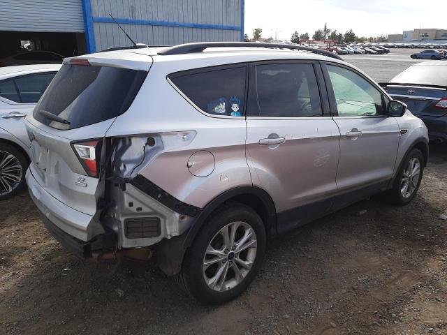Photo 3 from auction – 2018 FORD ESCAPE SE with VIN 1FMCU0GD1JUA65472