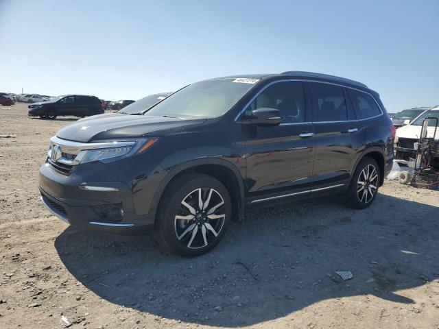 HONDA PILOT TOUR 2021 with VIN 5FNYF5H67MB041899 - Photo from auction