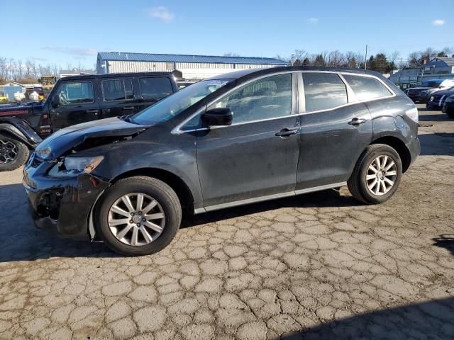 MAZDA CX-7 2011 with VIN JM3ER2AM7B0358070 - Photo from auction