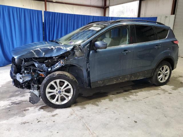 FORD ESCAPE SE 2018 with VIN 1FMCU9GD4JUC62950 - Photo from auction