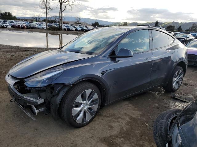 TESLA MODEL Y 2023 with VIN 7SAYGDEEXPF814424 - Photo from auction