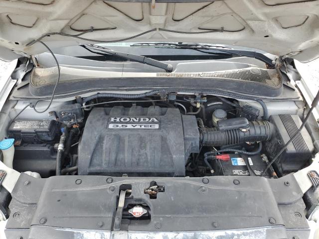 Photo 11 from auction – 2006 HONDA PILOT EX with VIN 2HKYF18556H555819