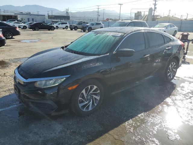 HONDA CIVIC EX 2017 with VIN 2HGFC2F73HH527556 - Photo from auction