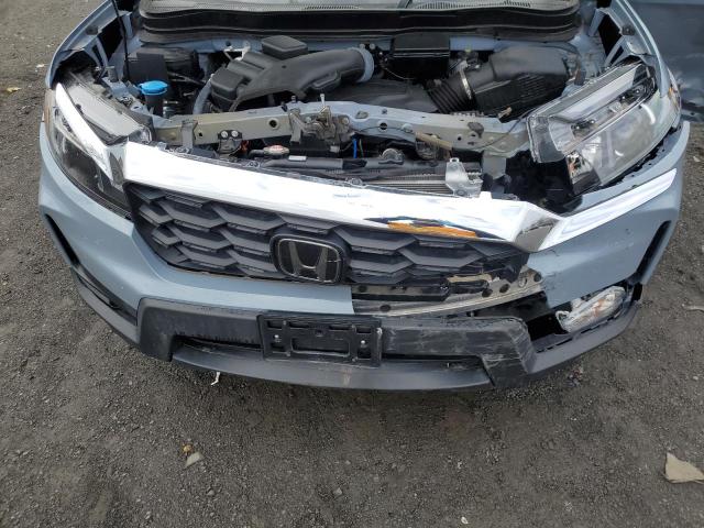Photo 11 from auction – 2022 HONDA PASSPORT E with VIN 5FNYF8H57NB007391