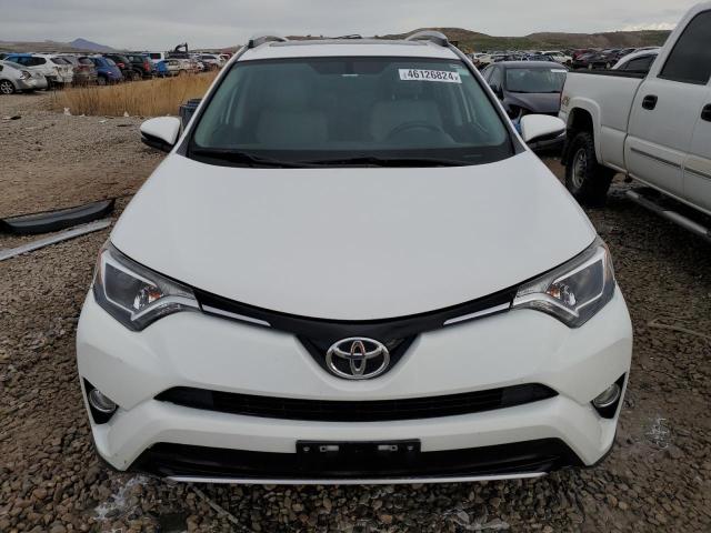 Photo 5 from auction – 2016 TOYOTA RAV4 XLE with VIN JTMRFREV3GJ065637