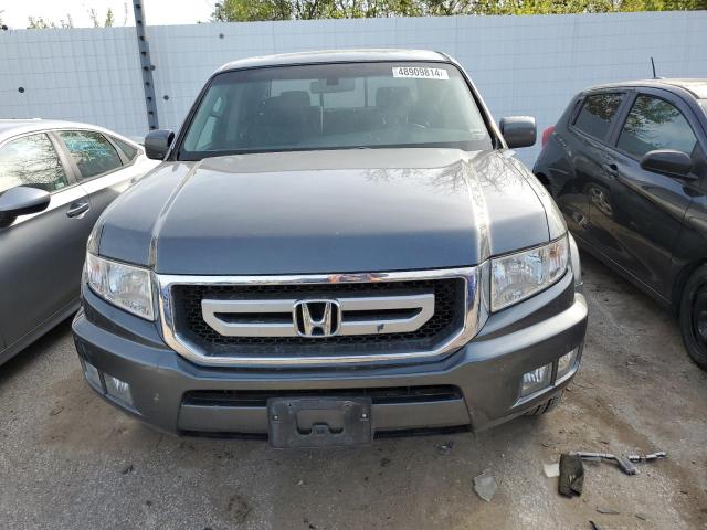 Photo 5 from auction – 2011 HONDA RIDGELINE with VIN 5FPYK1F57BB451914