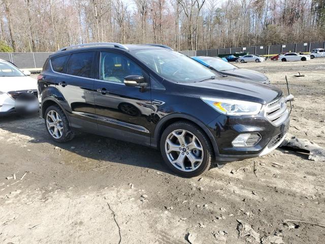 Photo 4 from auction – 2017 FORD ESCAPE TIT with VIN 1FMCU0J98HUA61725