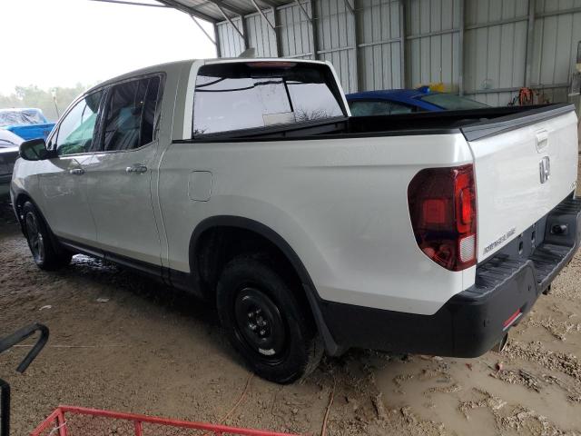 Photo 2 from auction – 2022 HONDA RIDGELINE with VIN 5FPYK3F79NB034568