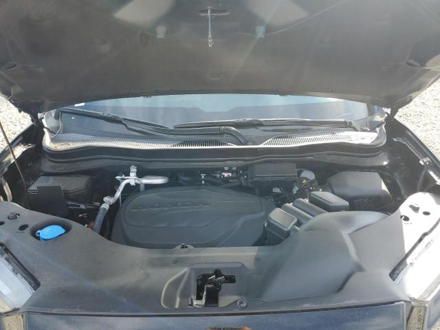 Photo 12 from auction – 2023 HONDA PASSPORT E with VIN 5FNYF8H01PB030270
