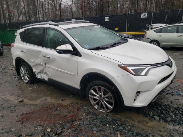 Photo 4 from auction – 2018 TOYOTA RAV4 LIMIT with VIN 2T3DFREV1JW738928