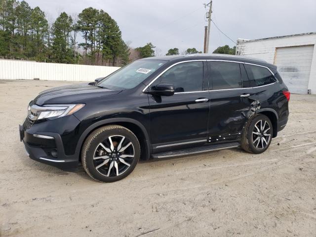 HONDA PILOT ELIT 2019 with VIN 5FNYF6H03KB007182 - Photo from auction