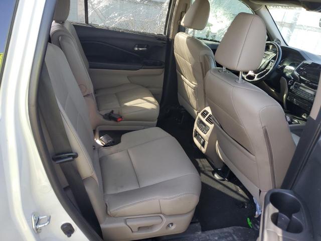 Photo 11 from auction – 2021 HONDA PILOT TOUR with VIN 5FNYF5H61MB026542