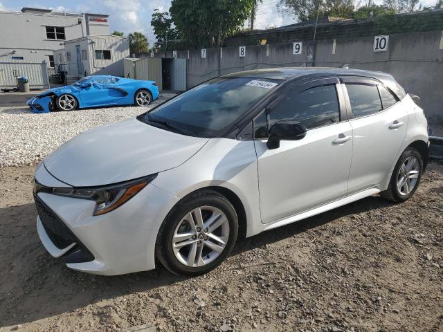 TOYOTA COROLLA SE 2021 with VIN JTND4MBE0M3113405 - Photo from auction