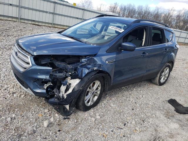 FORD ESCAPE SE 2018 with VIN 1FMCU0GD5JUC18242 - Photo from auction