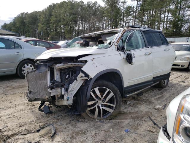 HONDA PILOT TOUR 2017 with VIN 5FNYF6H9XHB004528 - Photo from auction