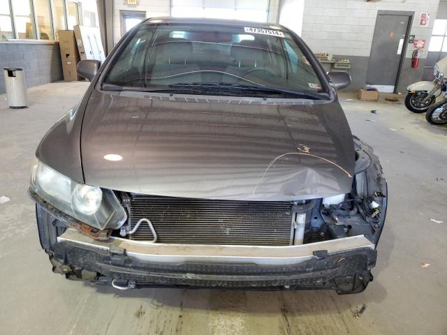 Photo 5 from auction – 2011 HONDA CIVIC LX with VIN 19XFA1F52BE019403