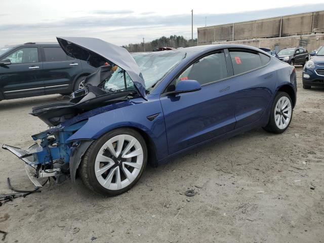TESLA MODEL 3 2023 with VIN 5YJ3E1EA0PF465606 - Photo from auction