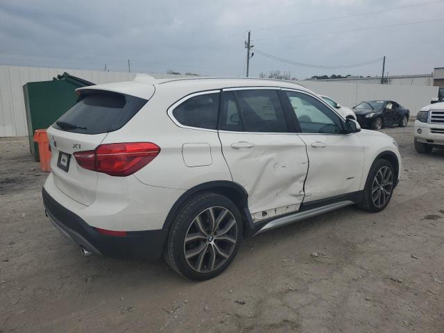Photo 3 from auction – 2018 BMW X1 XDRIVE2 with VIN WBXHT3C39J5K30886