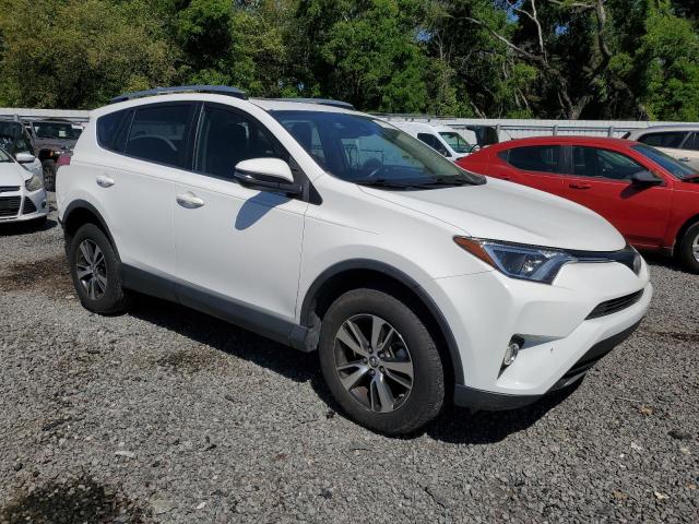 Photo 4 from auction – 2017 TOYOTA RAV4 XLE with VIN JTMWFREV7HD095551